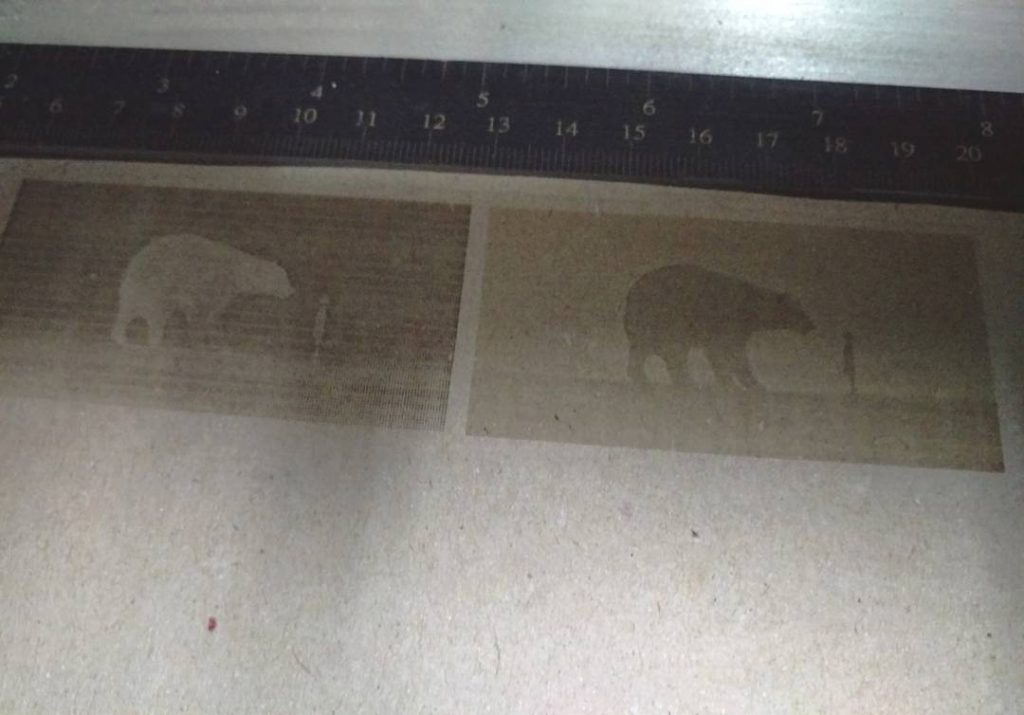 laser-engraved halftone bear and girl pictures
